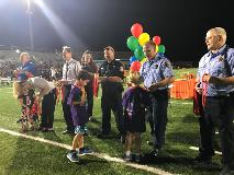 Our crews passing out medals at our local schools