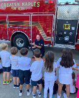 Captain 73 teaching a school camp about how we put out fires 