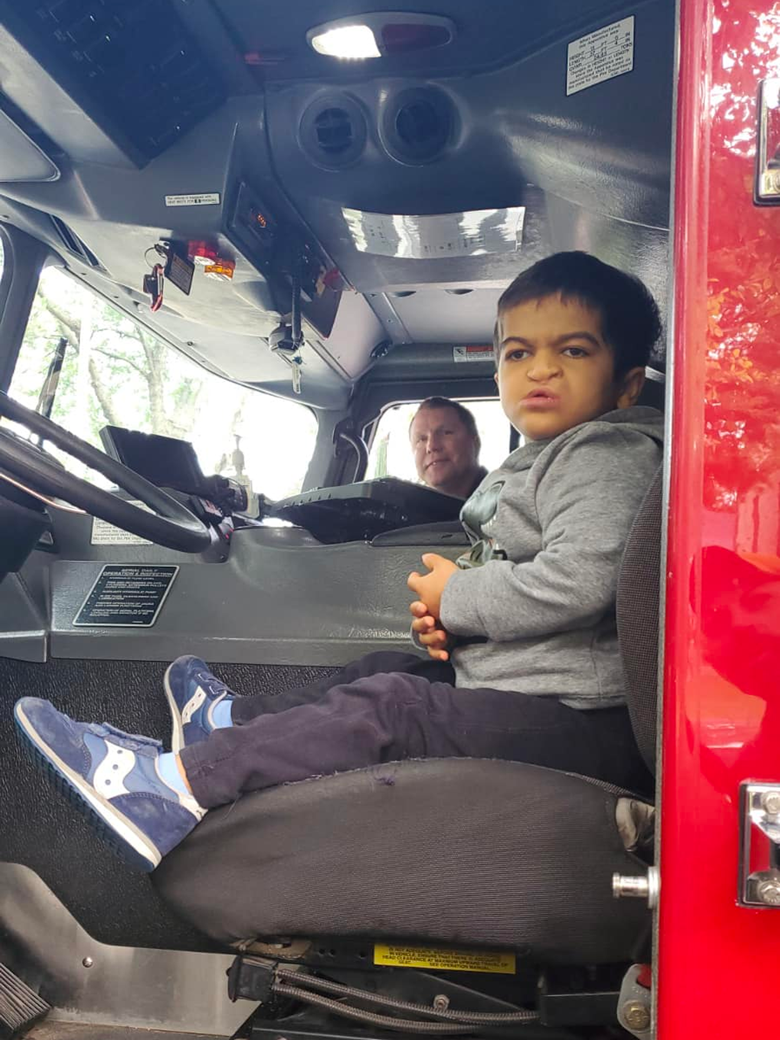 Fire buddy Ronan sits in Truck 3