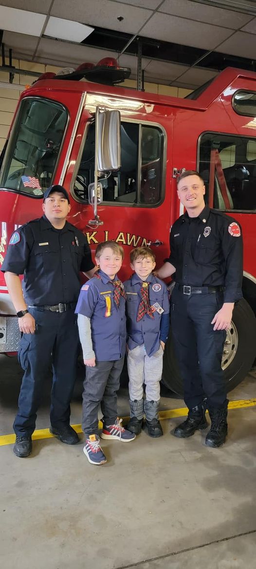 Oak Lawn FFs stand with Cub Scouts